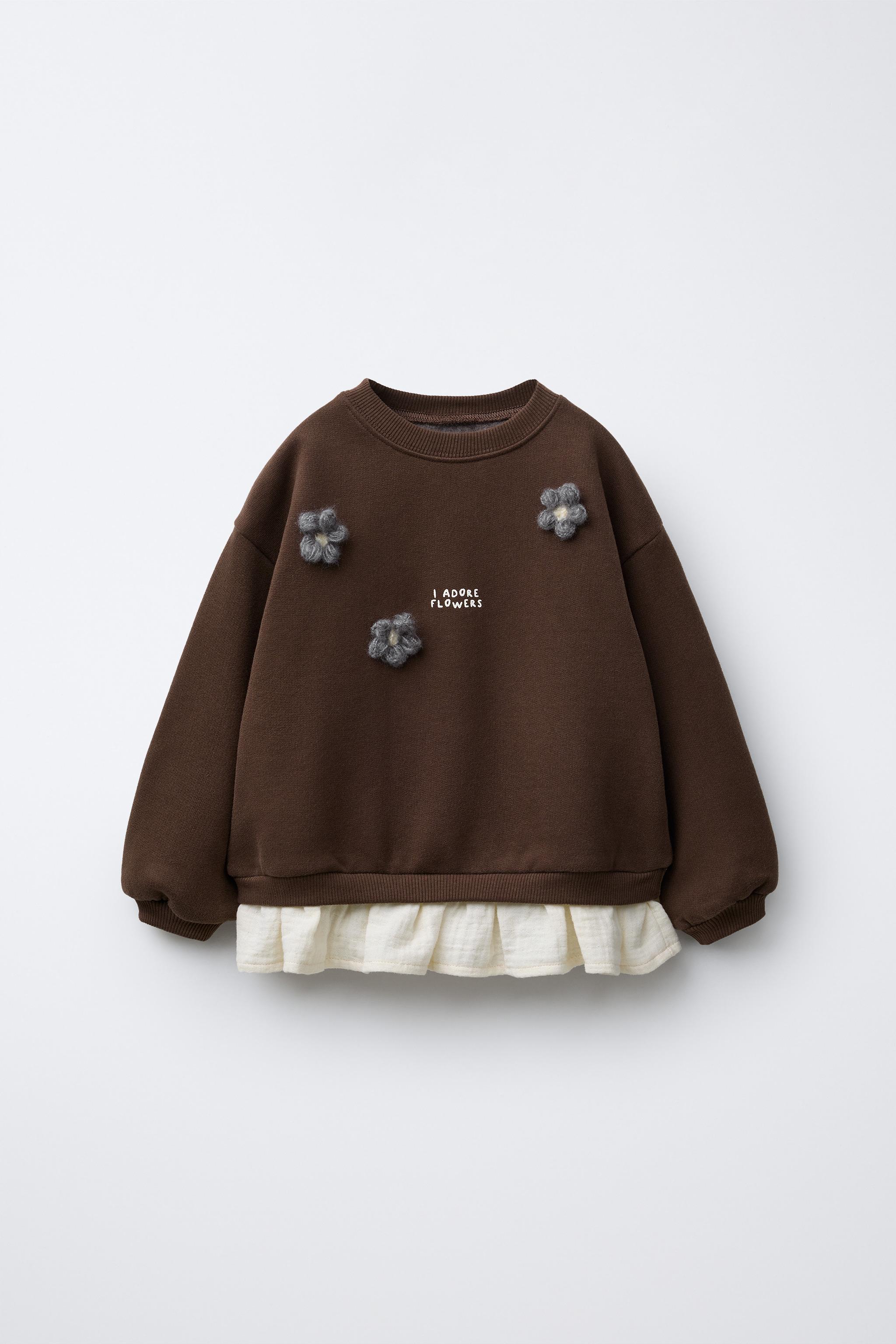 CONTRASTING FLORAL SWEATSHIRT